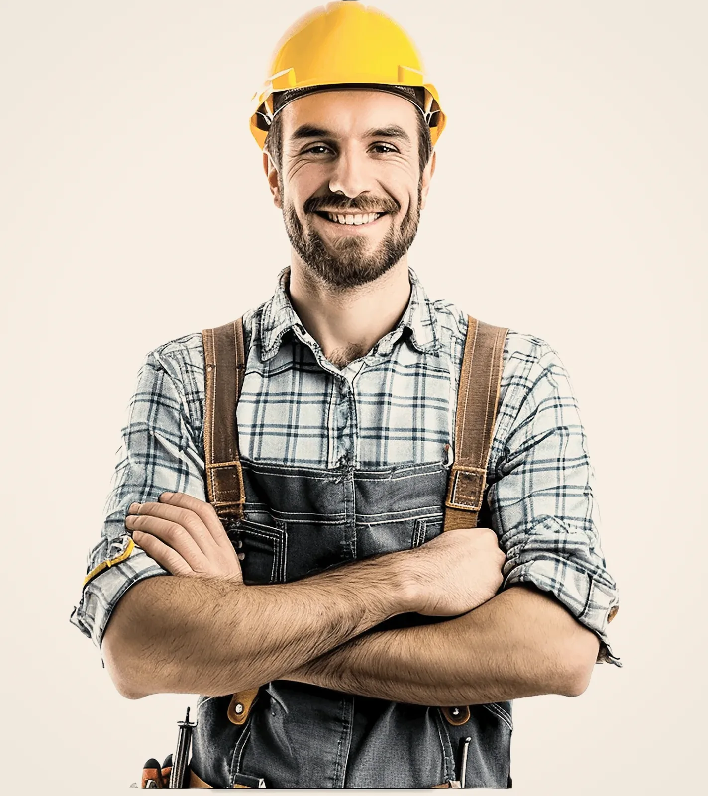 A man in a white helmet and overalls, arms crossed.