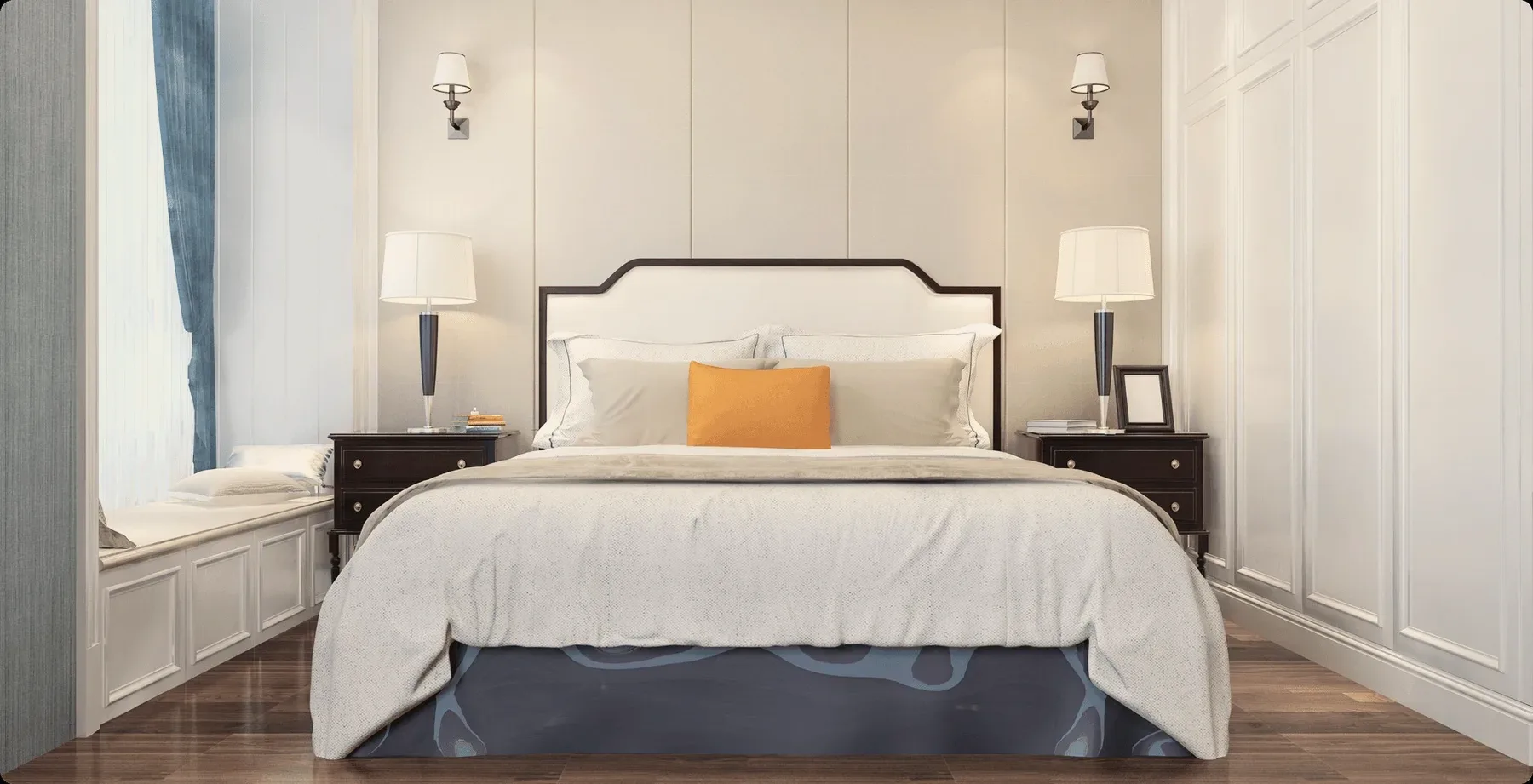 A bedroom with white panelling and an orange cushion.