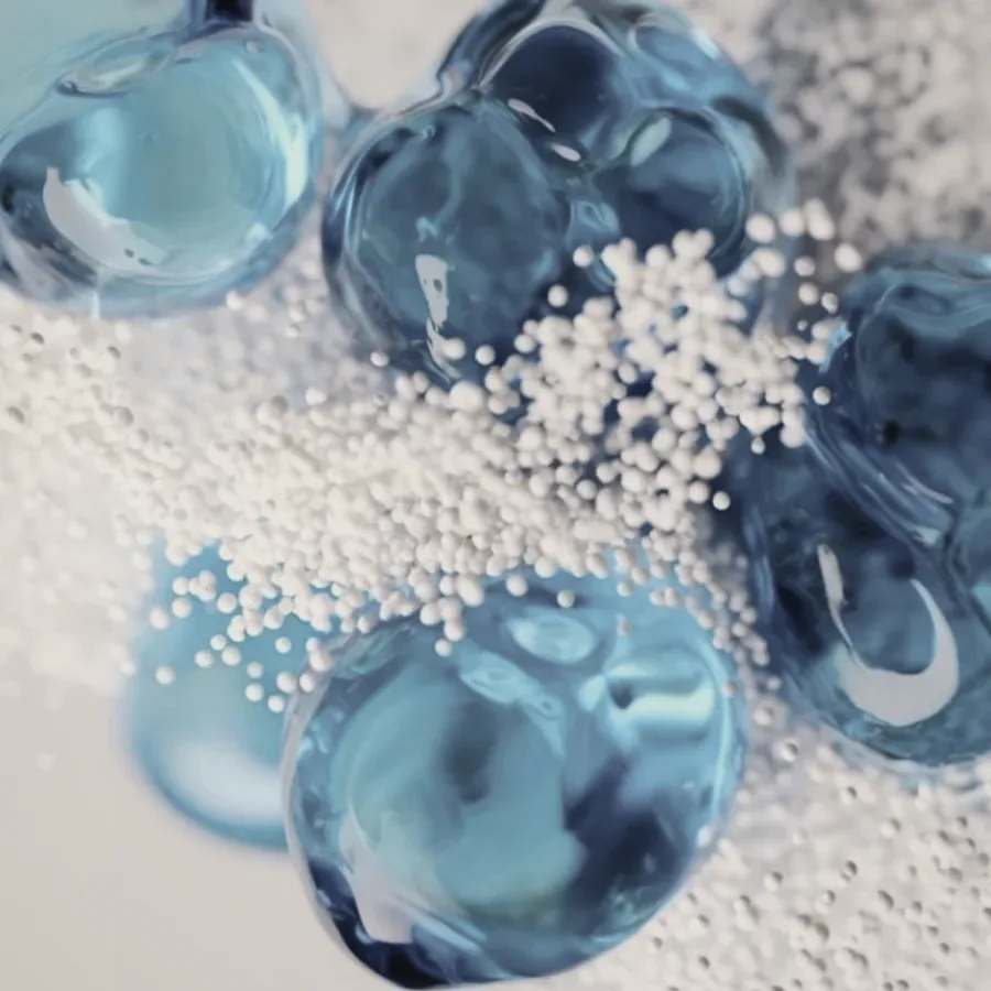 Blue gel spheres among white beads.