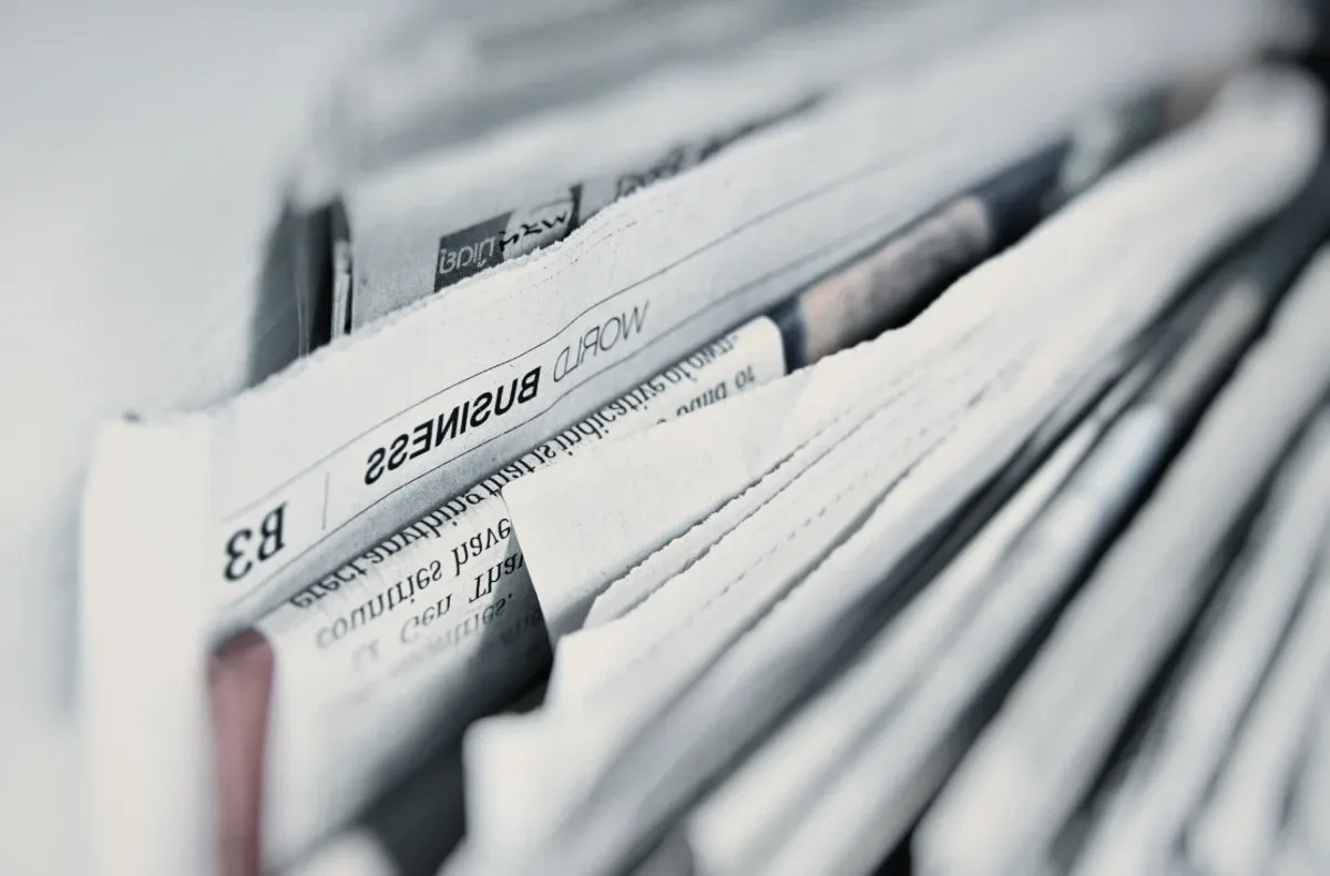 A stack of newspapers.