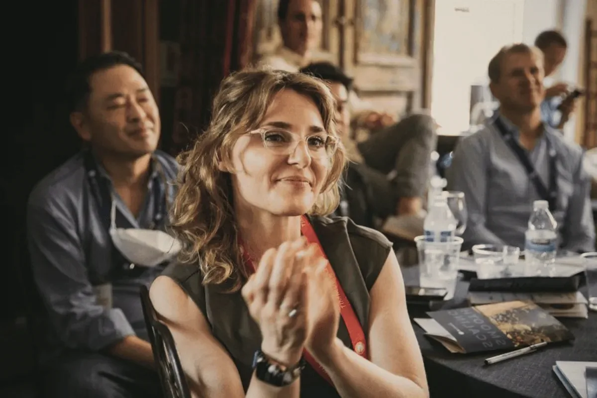 An audience member applauding.