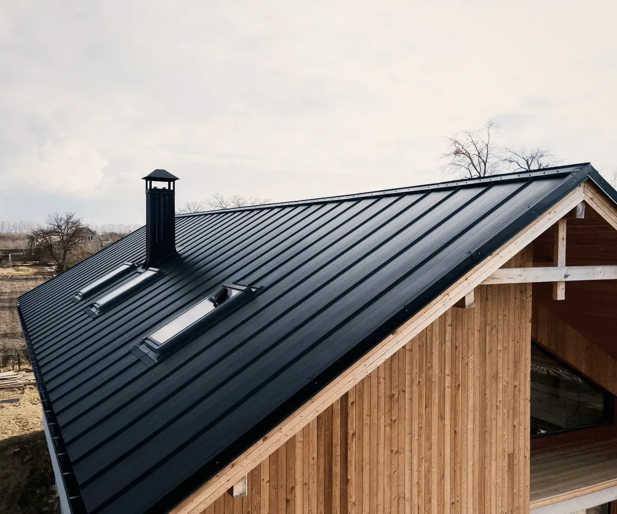 A metal roof with a skylight.