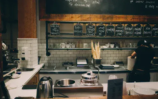 The restaurant: tables, dishes and the bar.